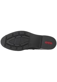 Semelle de chaussure en caoutchouc noir avec grip texturé, présentant des motifs rectangulaires et ovales, logo de marque en rouge, et une finition durable.