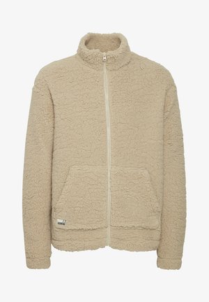 Beige Fleece-Jacke mit hohem Kragen, Frontreißverschluss und zwei Seitentaschen. Verfügt über eine strukturierte, weiche Oberfläche und einen cropped Saum.