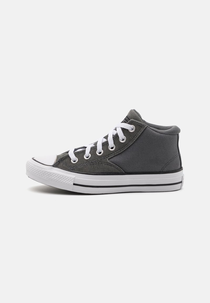 High-top gray canvas sneaker with white rubber toe cap, white laces, and black outsole stripe. Features textured fabric and metal eyelets.