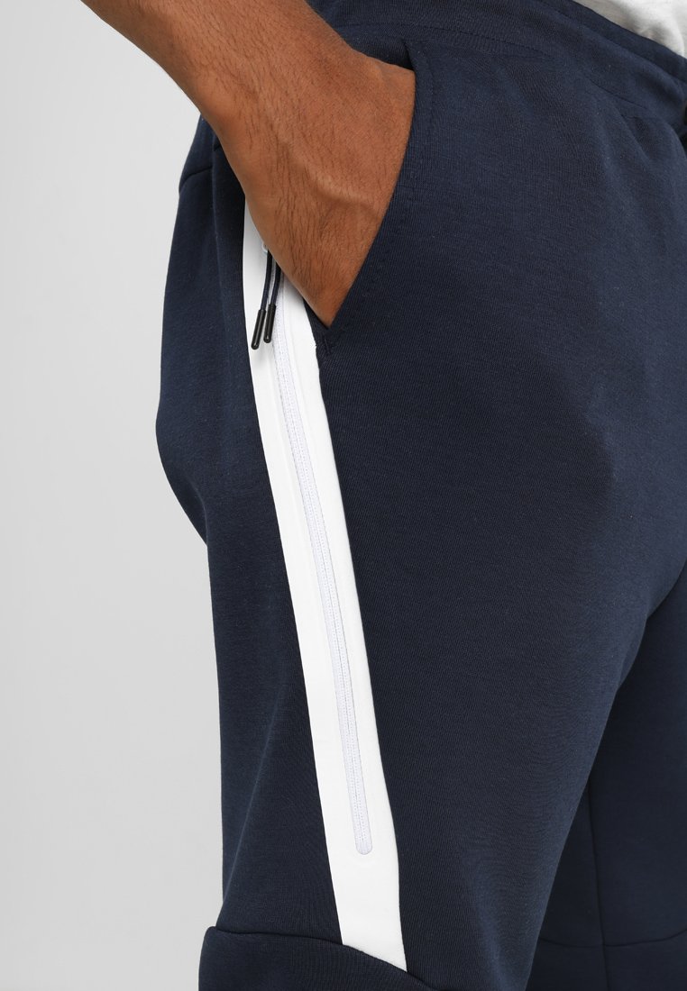 nike dark blue tracksuit