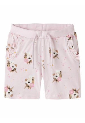 Jasnoróżowe szorty dla maluchów z nadrukiem twarzy jednorożców, falbankowanymi bocznymi kieszeniami i ściągaczem w pasie.