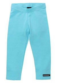Lichtblauwe katoenen legging met een elastische tailleband en een getailleerde pasvorm, voorzien van een zwart merkembleem op de onderkant van het linkerbeen.