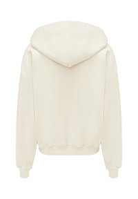 Krém színű kapucnis pulóver puha anyagból, oversized fazonban, bordás mandzsettával és cropped aljjal, látható címkék nélkül.