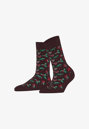 Braune Socken mit einem festlichen Muster aus roten und grünen Stechpalmenblättern, Beeren und Zuckerstangen. Weicher Stoff mit einem gerippten Bündchen.