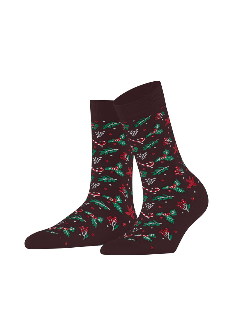 Braune Socken mit einem festlichen Muster aus roten und grünen Stechpalmenblättern, Beeren und Zuckerstangen. Weicher Stoff mit einem gerippten Bündchen.