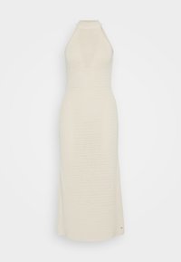 Robe halter en tricot écru. Présente un corsage ajusté avec un motif texturé et une jupe longue. Design sans manches avec un col haut.