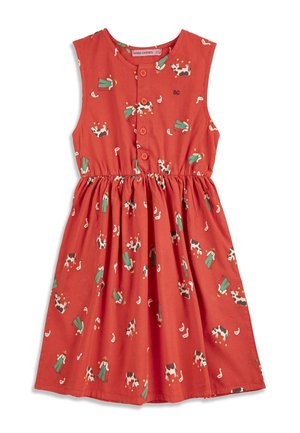 Sleeveless red dress with front buttons, featuring farm-themed prints of cows, farmers, and geese. Elastic waist and "BC" embroidery on chest.