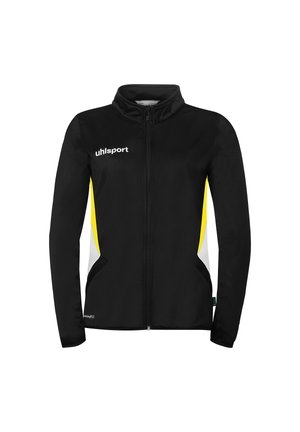 Veste de sport noire zippée avec des panneaux latéraux jaunes et blancs, manches longues, et logo "uhlsport" sur la poitrine gauche.