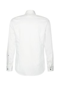 Chemise blanche à manches longues vue de dos avec des poignets boutonnés et un col classique sur un fond blanc uni.