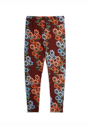 Leggings florales con un fondo marrón y flores naranjas y azules, una cinturilla elástica y un diseño ajustado.