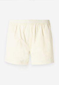 Lys gule bomullsshorts med elastisk midjebånd, med en avslappet passform og myk tekstur, uten synlige mønstre eller detaljer.