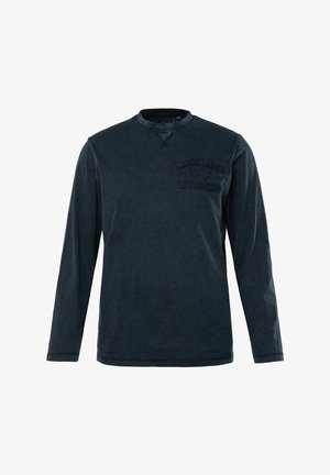 Lange mouwen marineblauw shirt van zacht katoen. Heeft een ronde hals en reliëftekst met de tekst "Lake Area 1881 Wyoming" op de borst.