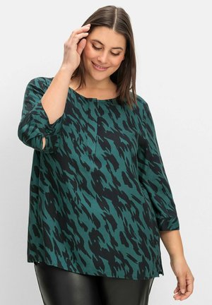 Sheego, Blouse - schwarz gemustert