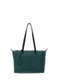 Sac cabas en cuir bleu sarcelle avec poign�ées noires, motif vertical cousu, et une petite étiquette attachée. Texture lisse, forme rectangulaire.