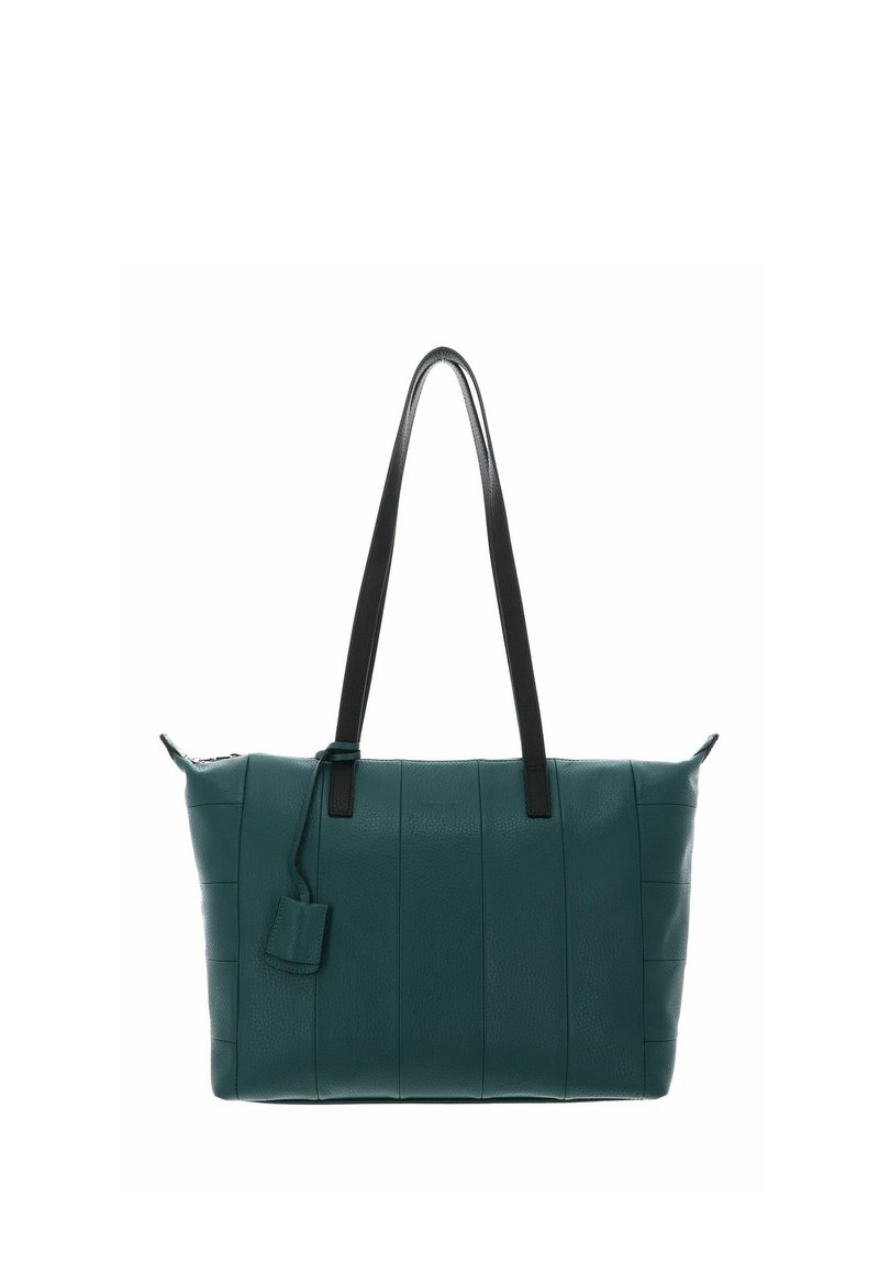 Sac cabas en cuir bleu sarcelle avec poignées noires, motif vertical cousu, et une petite étiquette attachée. Texture lisse, forme rectangulaire.