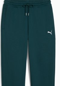 Teal sweatpants lavet af blødt stof, med bindebånd i livet, to sidelommer og et hvidt logo på venstre ben.