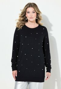Felpa nera a maniche lunghe con dettagli di perline bianche sparse, scollo rotondo, vestibilità comoda e tessuto morbido.