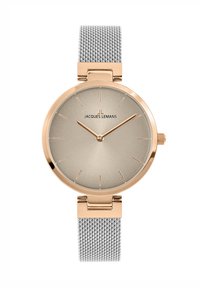 Rund ur med et guldtonet urkasse, beige skive og tynde timeindikatorer. Har et gråt mesh-armbånd og et minimalistisk design.