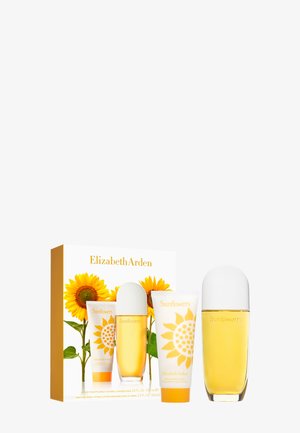 Set de regalo Elizabeth Arden Sunflowers que incluye un frasco de perfume y loción corporal, con gráficos de girasoles y una paleta de colores amarillo-naranja.