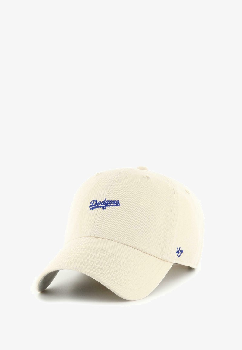 Beige Baseballcap aus Baumwolle mit gebogenem Schirm. Mit lila gesticktem "Dodgers"-Logo auf der Vorderseite und "47" an der Seite.