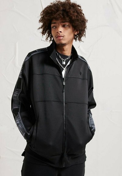 Puma SQUAD - Bomberjacke - black/schwarz - Zalando.ch