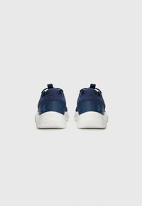 Navy blue athletic shoes with a breathable mesh upper, white sole, padded collar, and pull tab at the heel for easy wear.