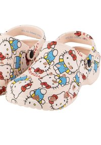 Pink clogs made of rubber with Hello Kitty patterns in various colors; features ventilation holes and side strap for a secure fit.