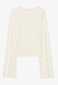 Bluza cu mâneci lungi, cu dungi, de culoare alb-crem. Prezintă un decolteu rotund și o siluetă scurtată. Textură netedă cu cusături drepte pe toată suprafața.