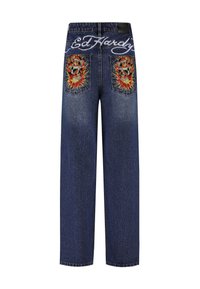 Jeans in denim blu con ricami di teschi e fiamme sui taschini posteriori e logo "Ed Hardy" sulla vita.