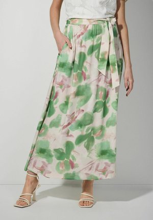 Lange, vloeiende rok in een pastelkleurig bloemenpatroon met groene en roze tinten. Voorzien van een gestrikte tailleband en zijzakken. Glad stof met een lichte textuur.