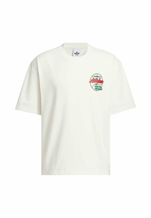 Bijela pamučna majica s kratkim rukavima, s okruglim izrezom i šarenim grafičkim printom na prsima koji prikazuje košarkaški turnir.