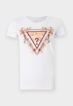 Weißes Baumwoll-T-Shirt mit einem dreieckigen grafischen Design, verziert mit floralen Akzenten und Strasssteinen. Das Logo "Guess U.S.A." ist prominent abgebildet.