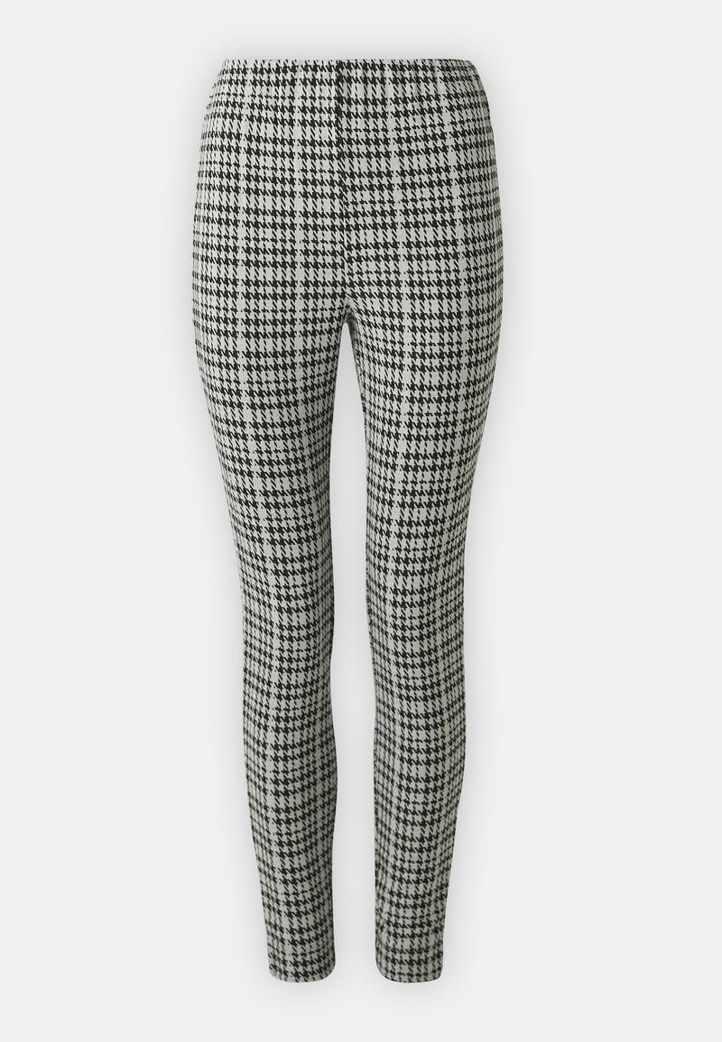 Leggings i hounds-tooth mönster i svart och vitt, med elastisk midjeått, smal passform och mjuk tygkänsla.