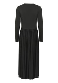 Long black dress featuring a fitted top with long sleeves and a pleated skirt. Made of soft fabric with a smooth texture.