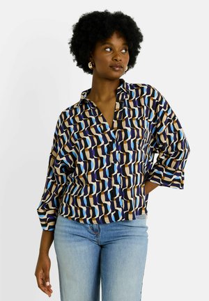 Chemise à motifs à manches courtes, présentant un mélange de courbes bleues, brunes et beige. Fabriquée en tissu lisse avec des détails de boutons.