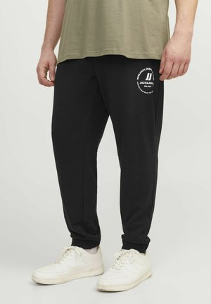 Pantalones deportivos - black