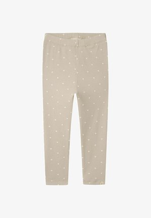 Beige bordázott leggings kis fehér szívmintákkal, elasztikus derékbőséggel és testhezálló fazonnal, alkalmas hétköznapi viseletre.