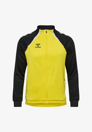 Giacca gialla e nera con colletto alto, chiusura con zip e accenti bianchi a contrasto. Realizzata in tessuto leggero e liscio, presenta un logo sul petto.