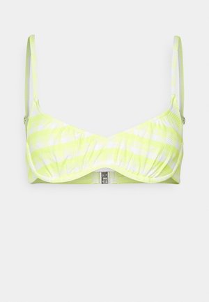 Top de bikini em padrão xadrez amarelo néon e branco, com alças ajustáveis, acabamento texturizado e fecho metálico na frente.