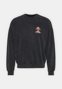 Czarna bluza z okrągłym dekoltem, długimi rękawami i ściągaczami na końcach rękawów. Na piersi znajduje się haftowany wzór. Miękka w dotyku.