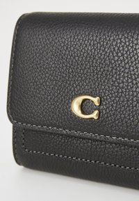 COACH MILA SMALL FLAP WALLET - Wallet - black