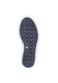 Suela de una zapatilla, que presenta una superficie de goma negra con un patrón hexagonal, bordes laterales blancos y un pequeño acento plateado.