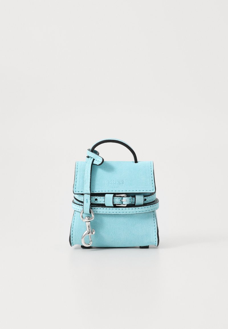 Mini backpack in light blue suede with black accents, featuring a top handle, adjustable strap, and silver-tone hardware.
