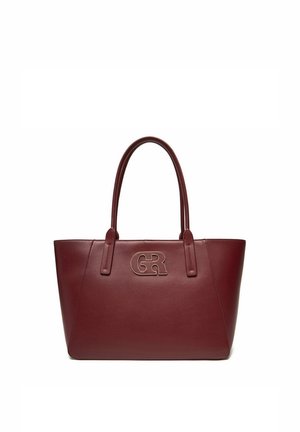 Dunkelroter Ledertasche mit zwei Griffen und einem metallischen "GR"-Logo, das mittig auf der Vorderseite angebracht ist.