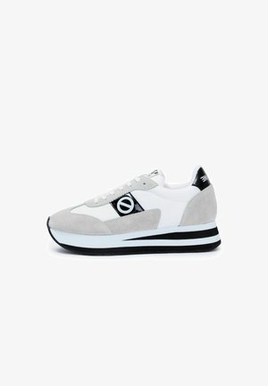 White and grey sneakers with suede and fabric materials, black accents, lace-up design, and a raised sole with horizontal stripes.