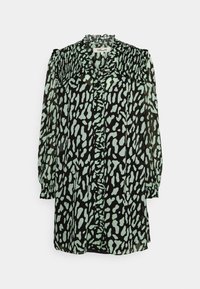 Musta ja mintunvihreä kuvioitu paita, jossa on röyhelökaulus, nappisuljenta ja pitkät hihat, joissa on joustavat hihansuut. Kevyt, läpikuultava kangas.