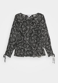 Blouse noire en voile transparent avec un motif complexe de tourbillons blancs. Comprend des manches longues avec des accents noués et une coupe ample, col rond.