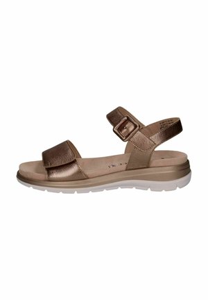 Sandales en bronze avec un dessus texturé, une large sangle avant et une fermeture à boucle. Dotées d'une semelle intérieure rembourrée et d'une semelle extérieure en caoutchouc blanc.
