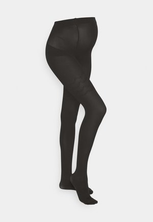 Collants opaques noirs avec une texture lisse. Une taille haute et un design comportant des motifs ondulés au niveau des cuisses. Style avec pieds.