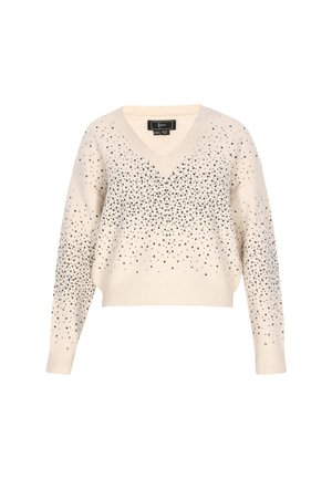 Svetr s výstřihem do V v krémovém pleteném materiálu, zdobený černými ozdobami v rozptýleném vzoru, s dlouhými rukávy a zkrácenou siluetou.